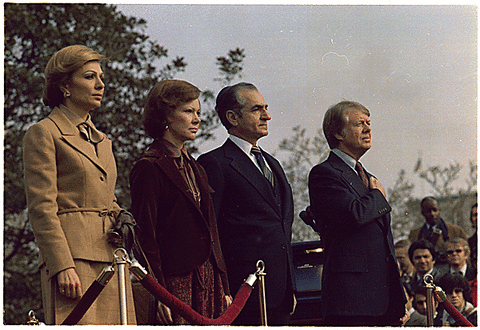 The Carters stand with the Shah of Iran Mohammed Reza Pahlavi and Empress Farah Pahlavi The Carters stand with the Shah of Iran Mohammed Reza Pahlavi and Empress Farah Pahlavi