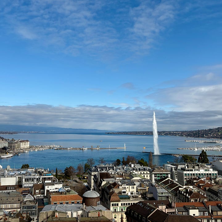 Geneva’s Jet d’Eau, soaring above Lake Geneva with the mountains beyond.