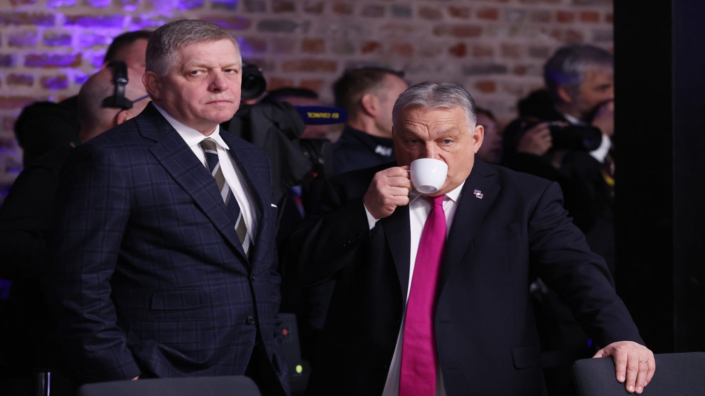 A person in suit drinking from a cup

AI-generated content may be incorrect.