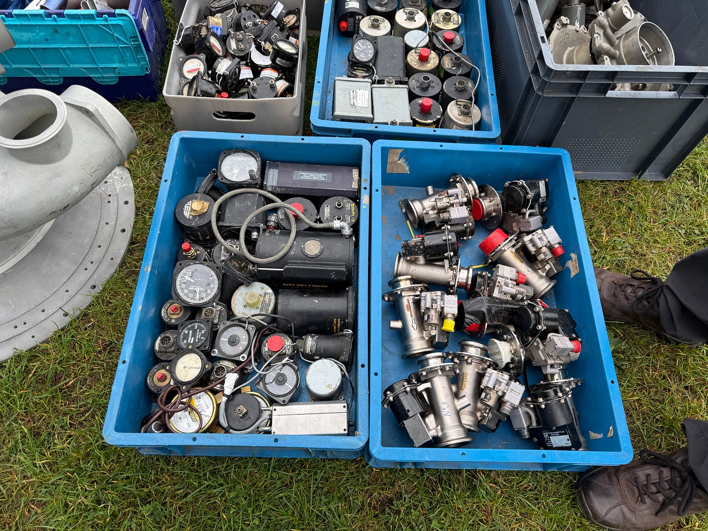 Boxes of old aircraft gauges Boxes of old aircraft gauges