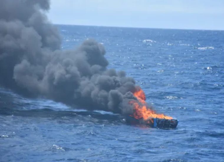 This cartel cocaine smuggling boat was set afire by the US Coast Guard after its drugs & crew were seized on August 16, 2025. This cartel cocaine smuggling boat was set afire by the US Coast Guard after its drugs & crew were seized on August 16, 2025.