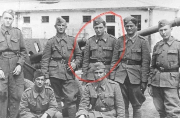 A group of men in military uniforms

AI-generated content may be incorrect.