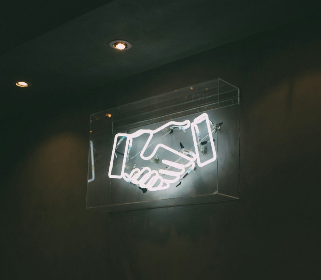 human hand neon signage human hand neon signage