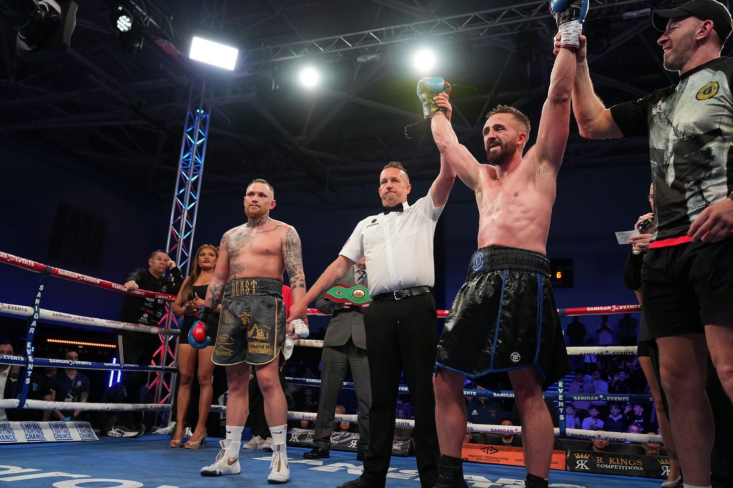 Willy Gilheaney's hand is raised in victory as the announcement of his win over Ethan George is made.