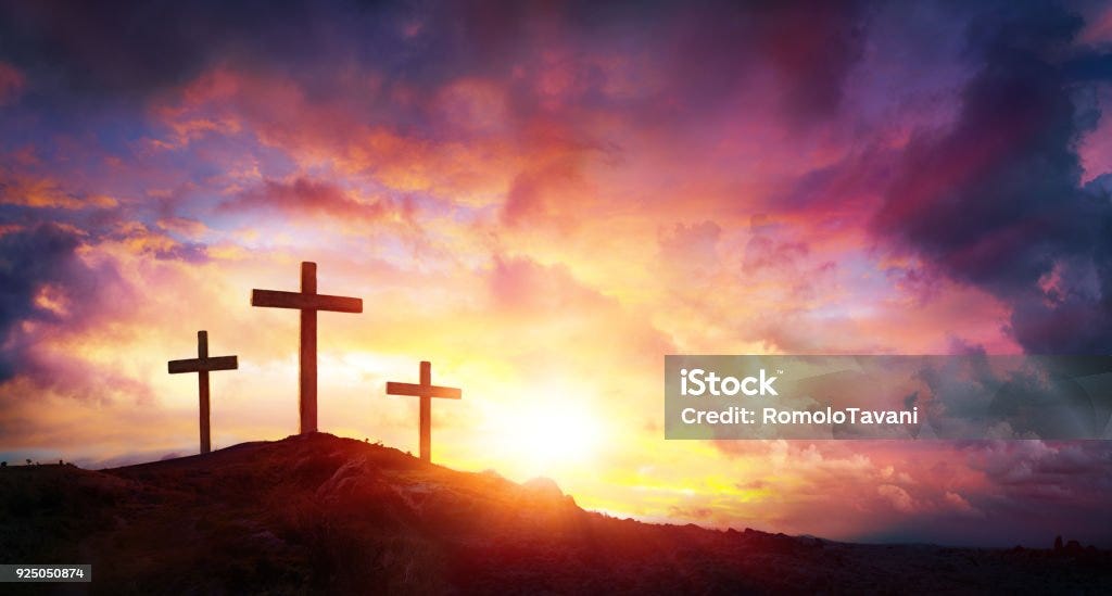 Crucifixion Of Jesus Christ  At Sunrise - Three Crosses On Hill Three Crosses On Mountain With Red Clouds Easter Stock Photo