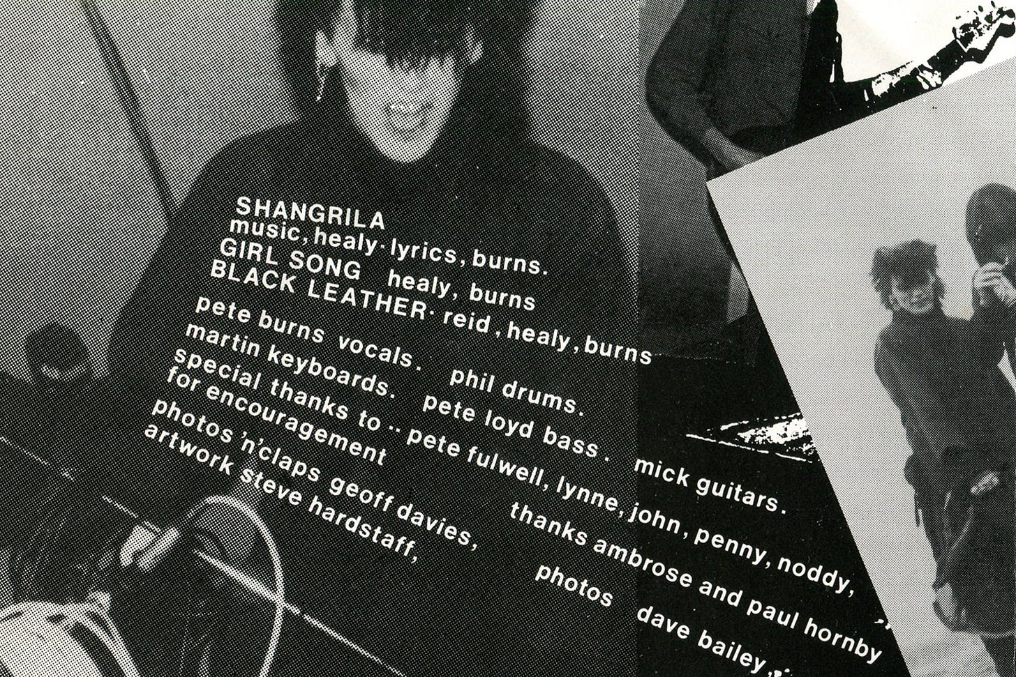 The inner sleeve of the Shangri-La EP by Nightmares in Wax, with a black and white photo of Pete Burns.