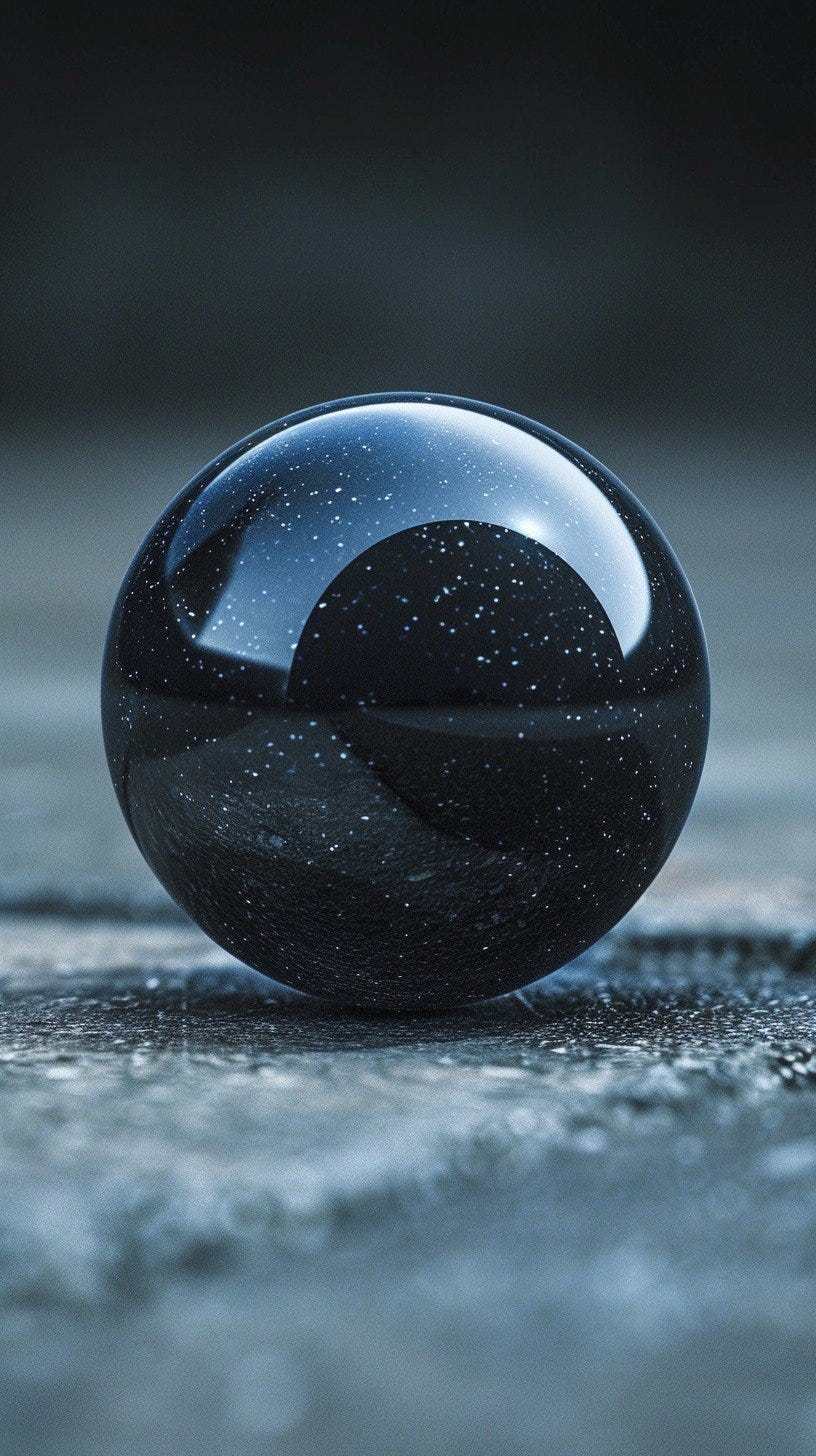 This captivating image features a mystical glass sphere elegantly placed on a rough textured surface. The dark, translucent glass captures the subtle interplay of light and shadow within its form, creating a contemplative and serene ambiance. Tiny specks of light, resembling distant stars, are scattered across the sphere's surface, enhancing its enigmatic allure. The cool, blue-toned background contrasts perfectly with the dark hues of the sphere, emphasizing its smooth and reflective nature.