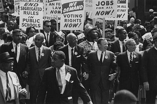 Image of protesters at 1963 March on Washington, with signs like "end segregated rules in public schools, and we demand voting rights and jobs for all now. Image of protesters at 1963 March on Washington, with signs like "end segregated rules in public schools, and we demand voting rights and jobs for all now.