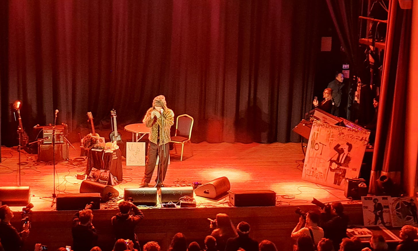 artist on stage in Islington Assembly Hall