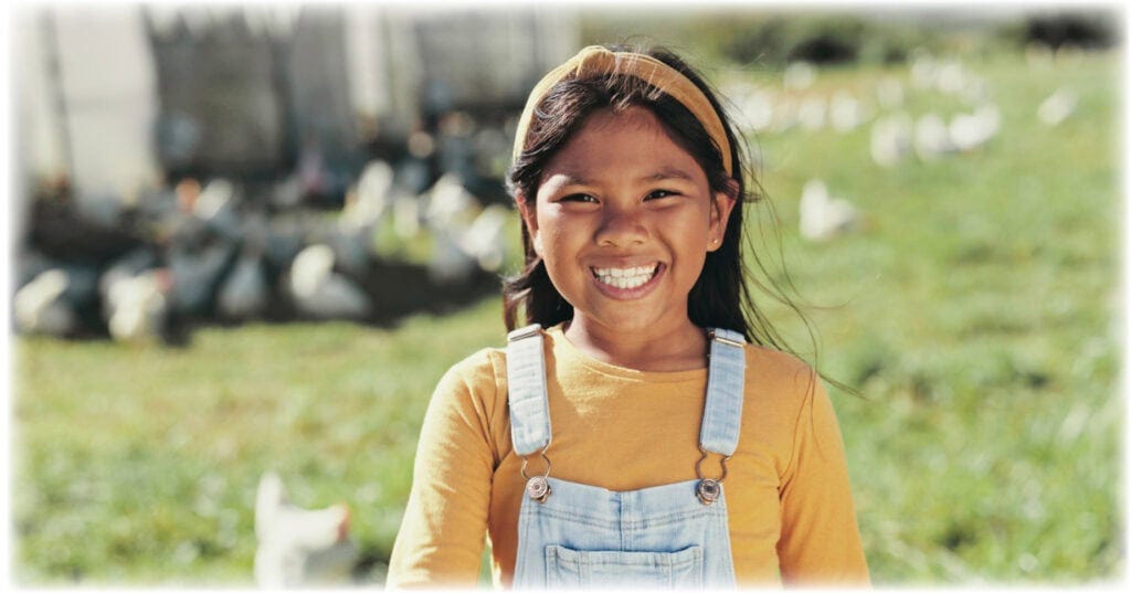 girl-child-and-smile-at-chicken-farm-for-portrait-2024-12-13-21-02-30-utc