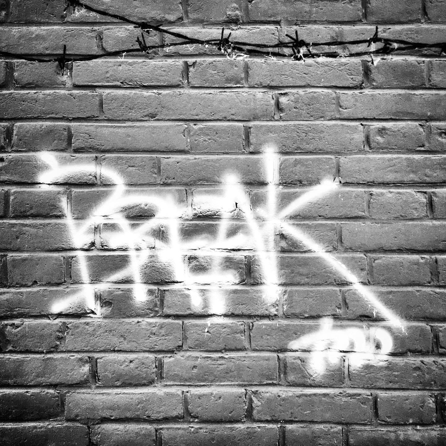 Graffiti in a Beijing hutong.