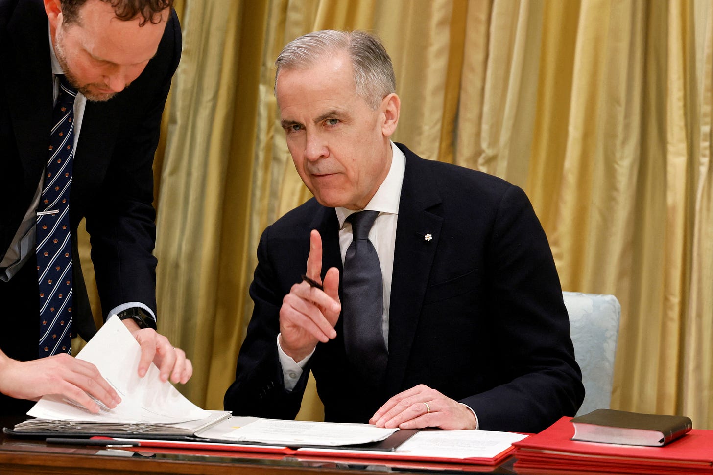 Mark Carney sworn in as Canada's prime minister, says he can work with  Trump | Reuters