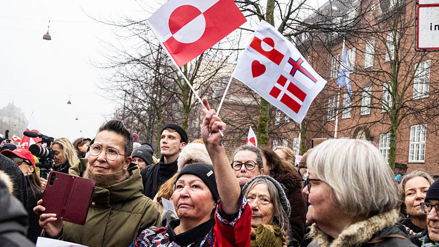 A demonstration under the slogans 'hands off Greenland' and 'Greenland for Greenlanders' takes place in front of the US embassy in Copenhagen, Denmark, on January 17, 2026. The demonstration shows solidarity with Greenland, the Greenlandic people, and 'Rigsfaellesskabet'. (Photo by Kristian Tuxen Ladegaard Berg/NurPhoto via Getty Images)