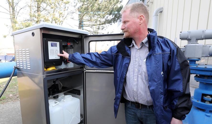 Plant engineer Holger Stählke programs automatic sampling at Nordwasser for the examination for pathogens in Germany, March 24, 2022, photo by Bernd Wüstneck/dpa-Zentralbild/dpa/Reuters