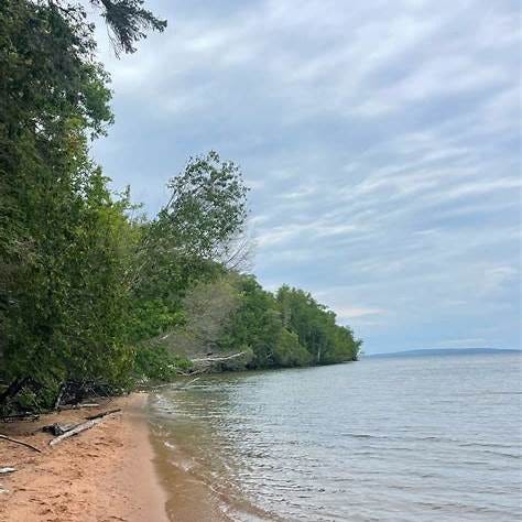 https://wisconsinharbortowns.net/wp-content/uploads/2021/12/Frog-Bay-Tribal-Nationa-Park-Beach-1LH.jpg