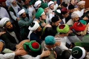 Naqshbandi sufis performing the bayah ritual. Urs of Mawlana Cheikh Muhammad Nazim Adil al-Haqqani in Lefke, Cyprus. Naqshbandi sufis performing the bayah ritual. Urs of Mawlana Cheikh Muhammad Nazim Adil al-Haqqani in Lefke, Cyprus.