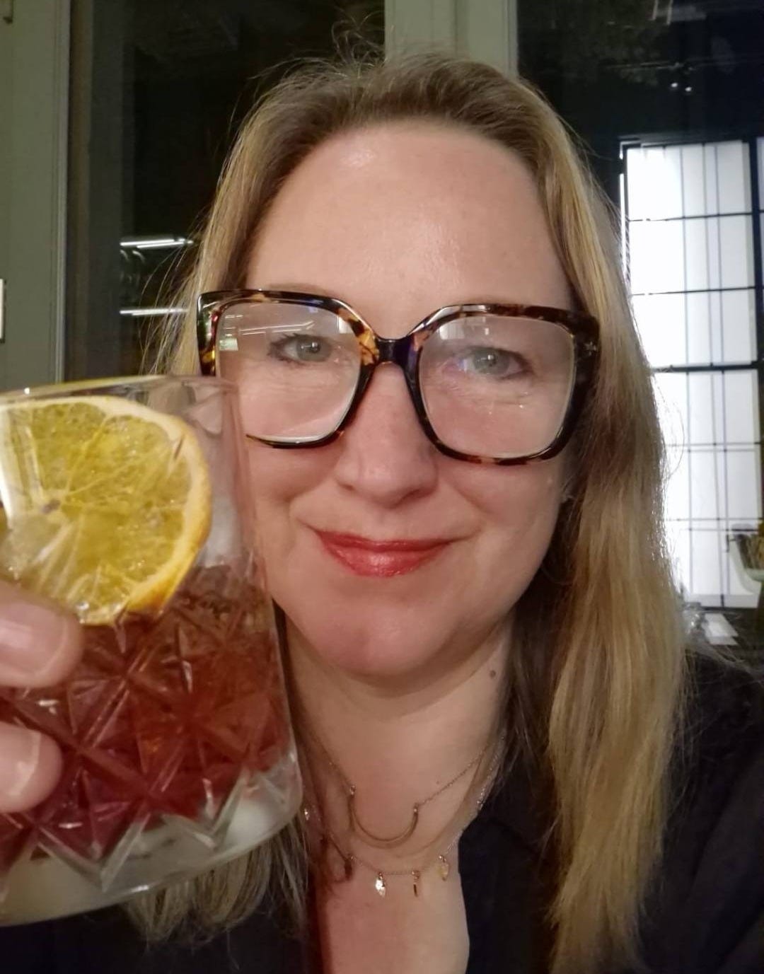 May be an image of 1 person and drink