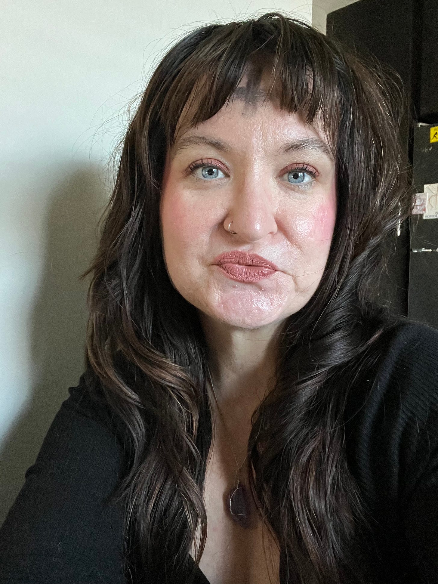 Pic of EJW with ashes on her forehead from an Ash Wednesday service