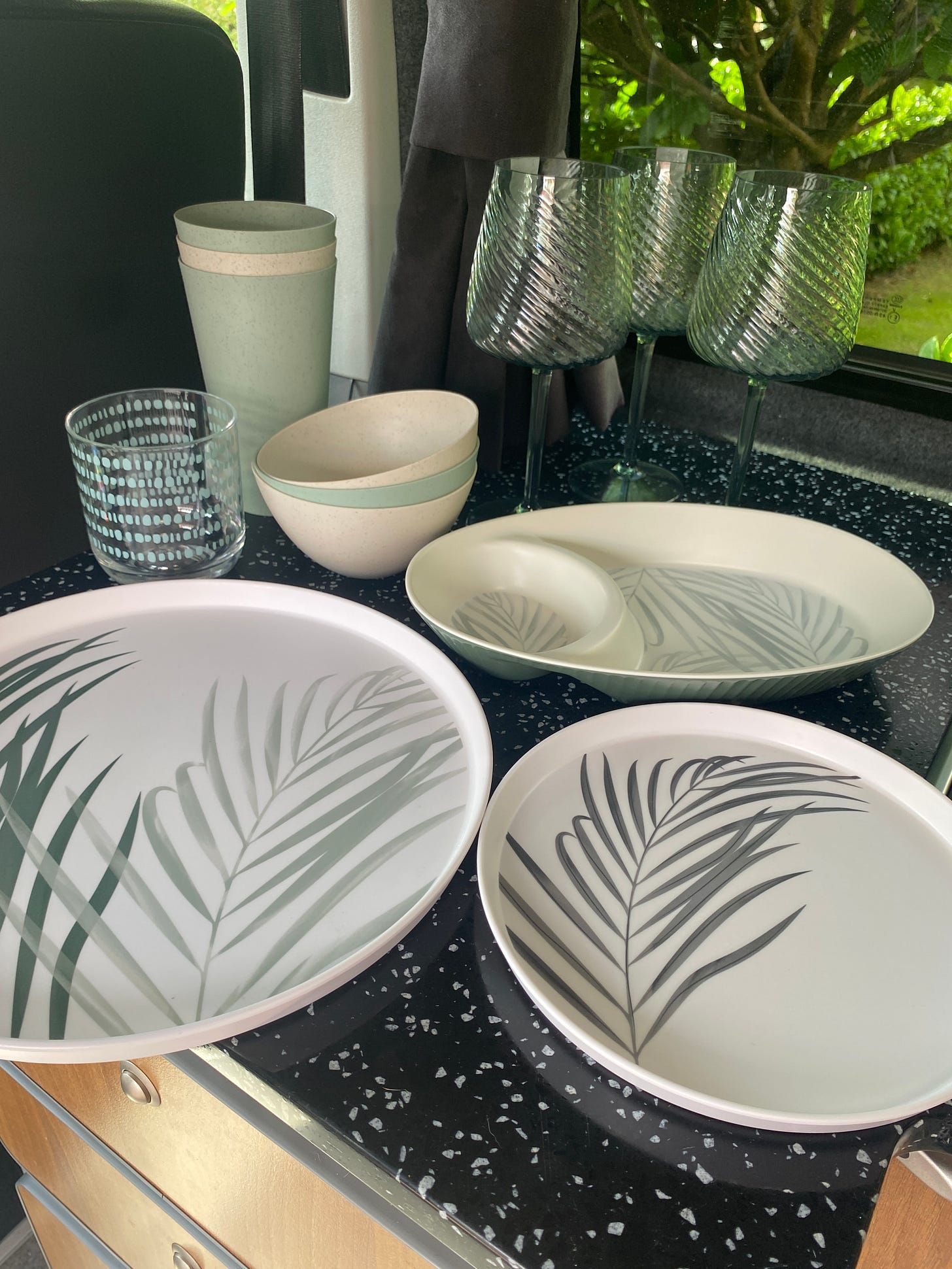 camping plates and glasses in cream and sage green