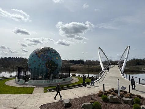 Riverfront park, pedestrian bridge, picnic