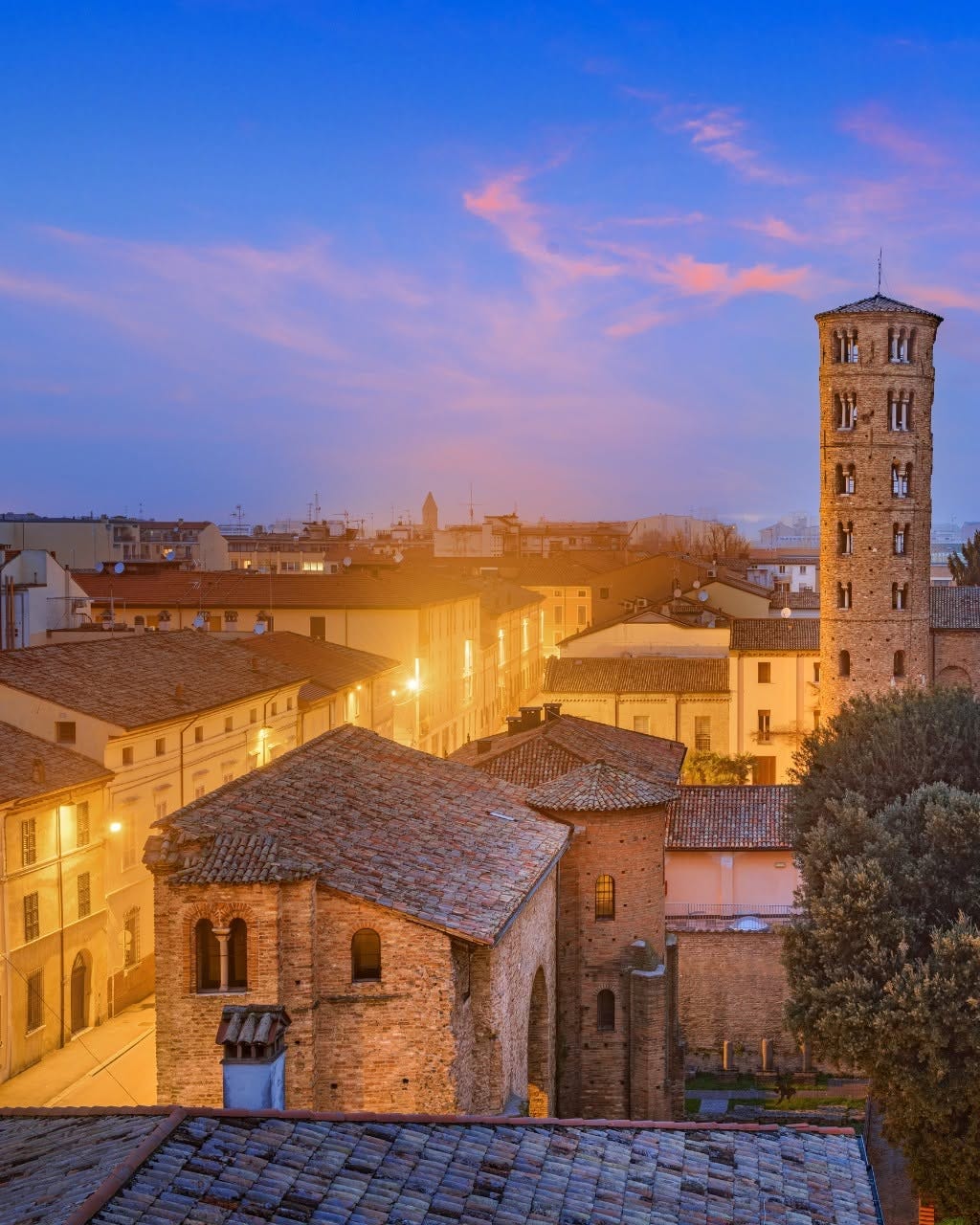 May be an image of bell tower and the Arno River
