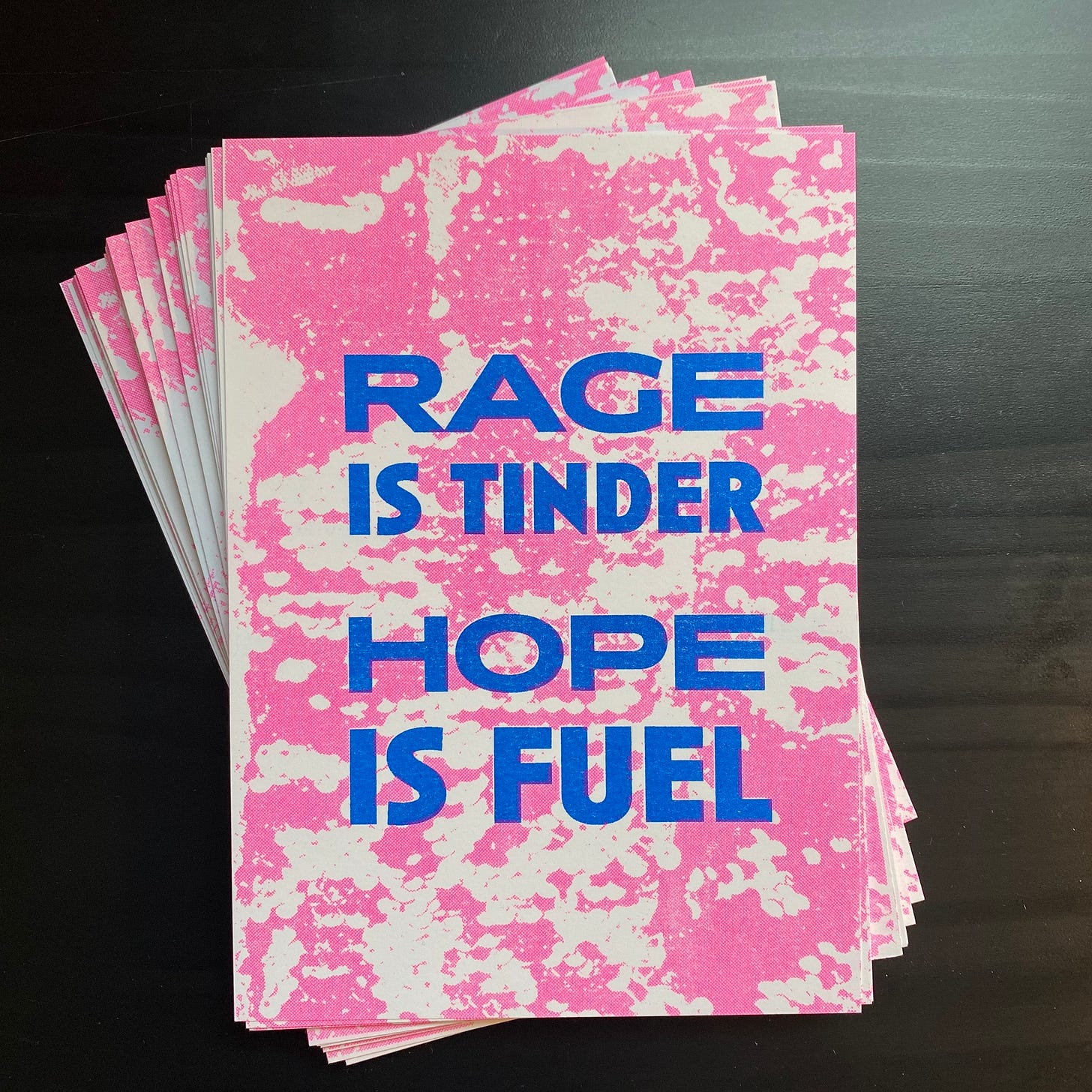 riso print: rage is tinder/hope is fuel — radical emprints