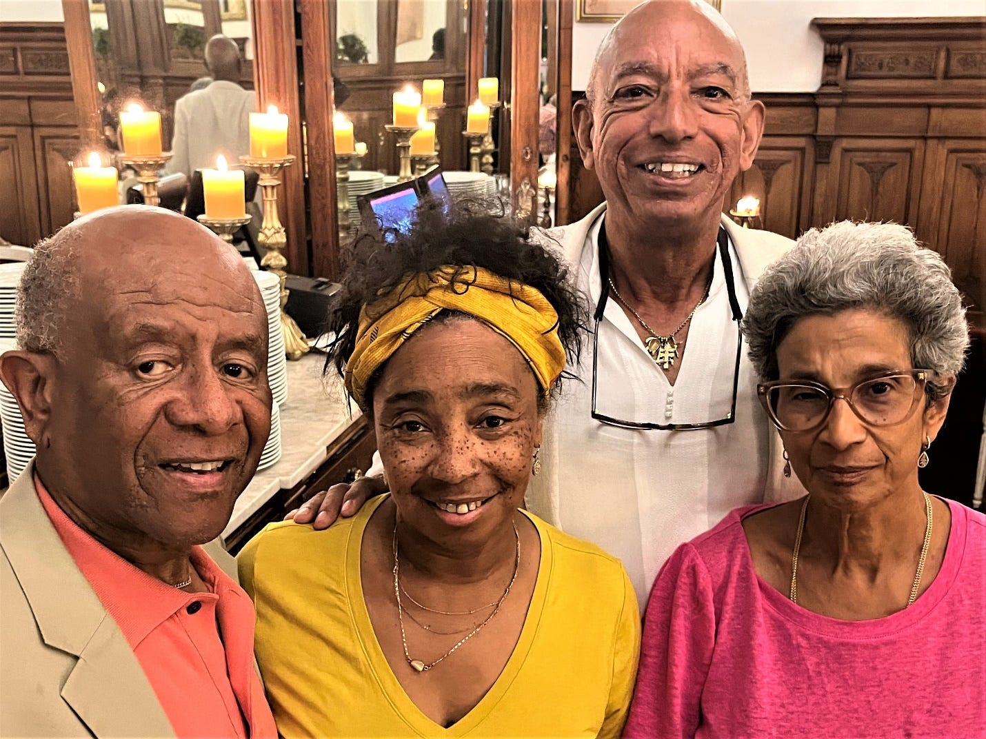 A group of people posing for a photo

Description automatically generated
