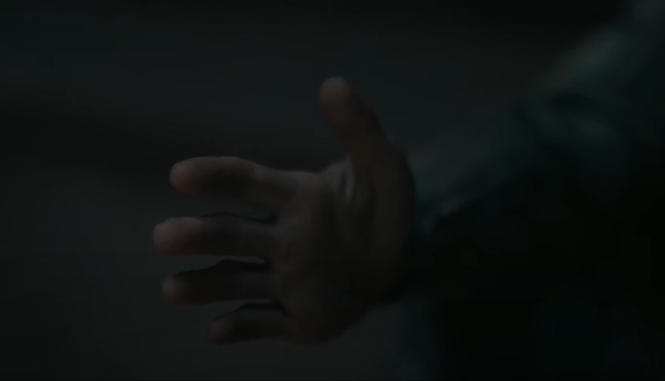 An image of the character, Paul Atreides' hand, from Denis Villeneuve's Dune Part 2. Played by Timothee Chalamet, the scene is when Paul drank the water of life awakening psychic powers, explaining the future path he must take to his mother, Jessica played by Rebecca Ferguson