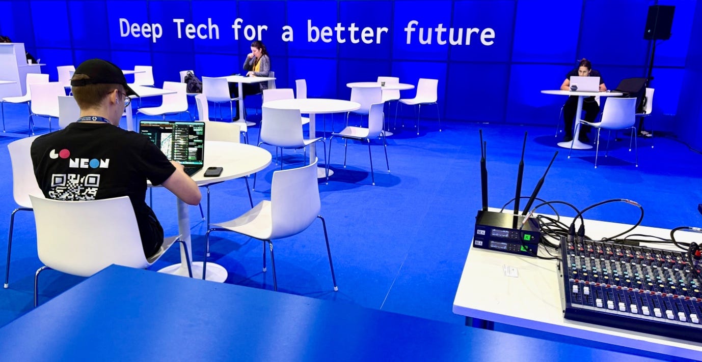 A person sitting at a table with a computer

AI-generated content may be incorrect.