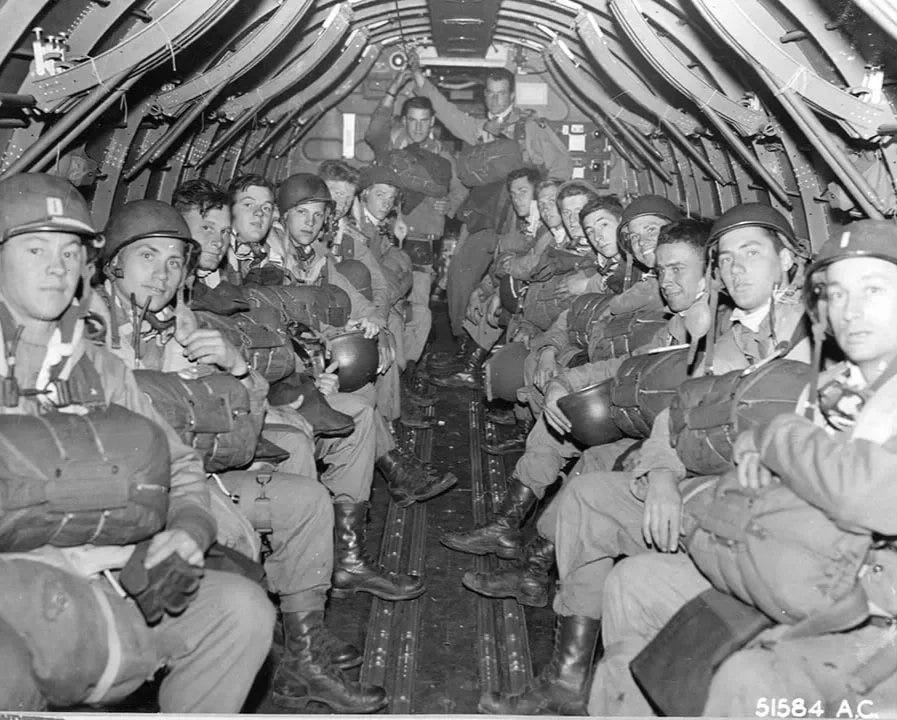  Paratroopers prepare for takeoff for Normandy. Photo courtesy US Army Signal Corps. 