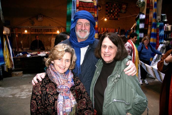 A group of people posing for a photo

Description automatically generated