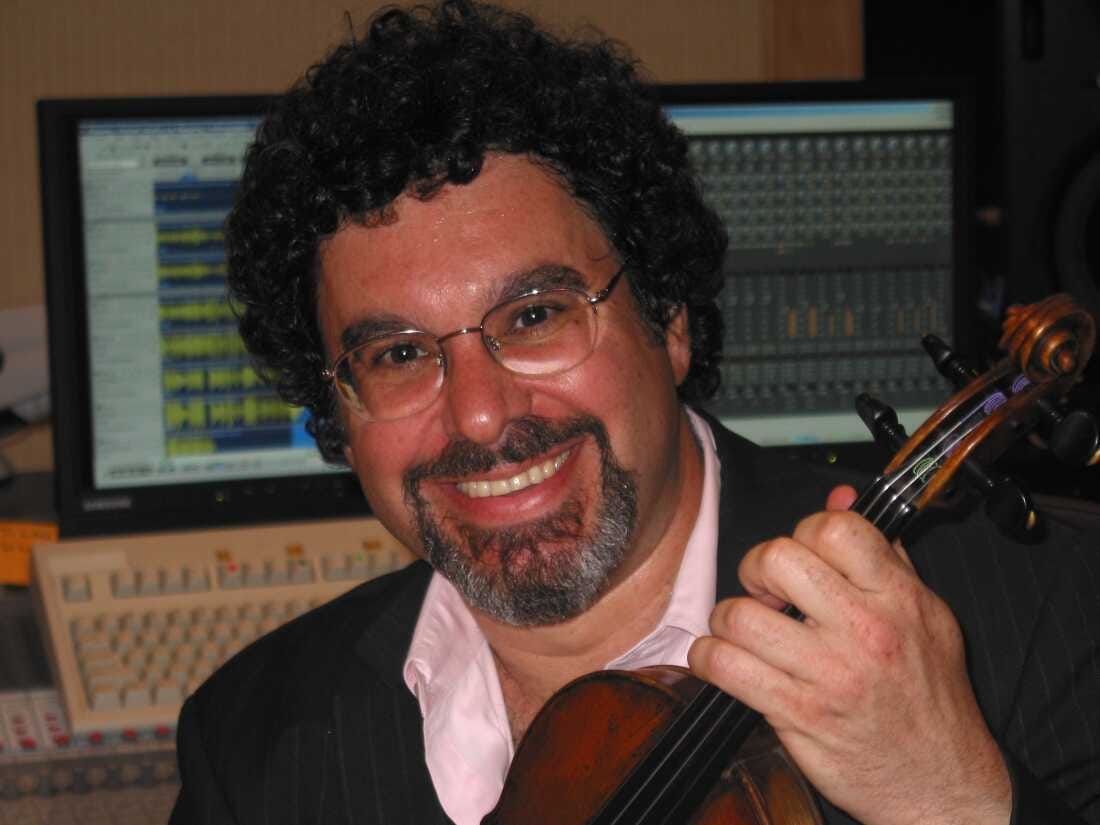 Classical music producer Adam Abeshouse was diagnosed with bile duct cancer last spring. His clients — including Simone Dinnerstein, Jeremy Denk and  Joshua Bell — performed a concert in his home studio to bid farewell. “I was just thinking of how many of us wanted to celebrate Adam while he’s still here,” said pianist Lara Downes, who organized the event.