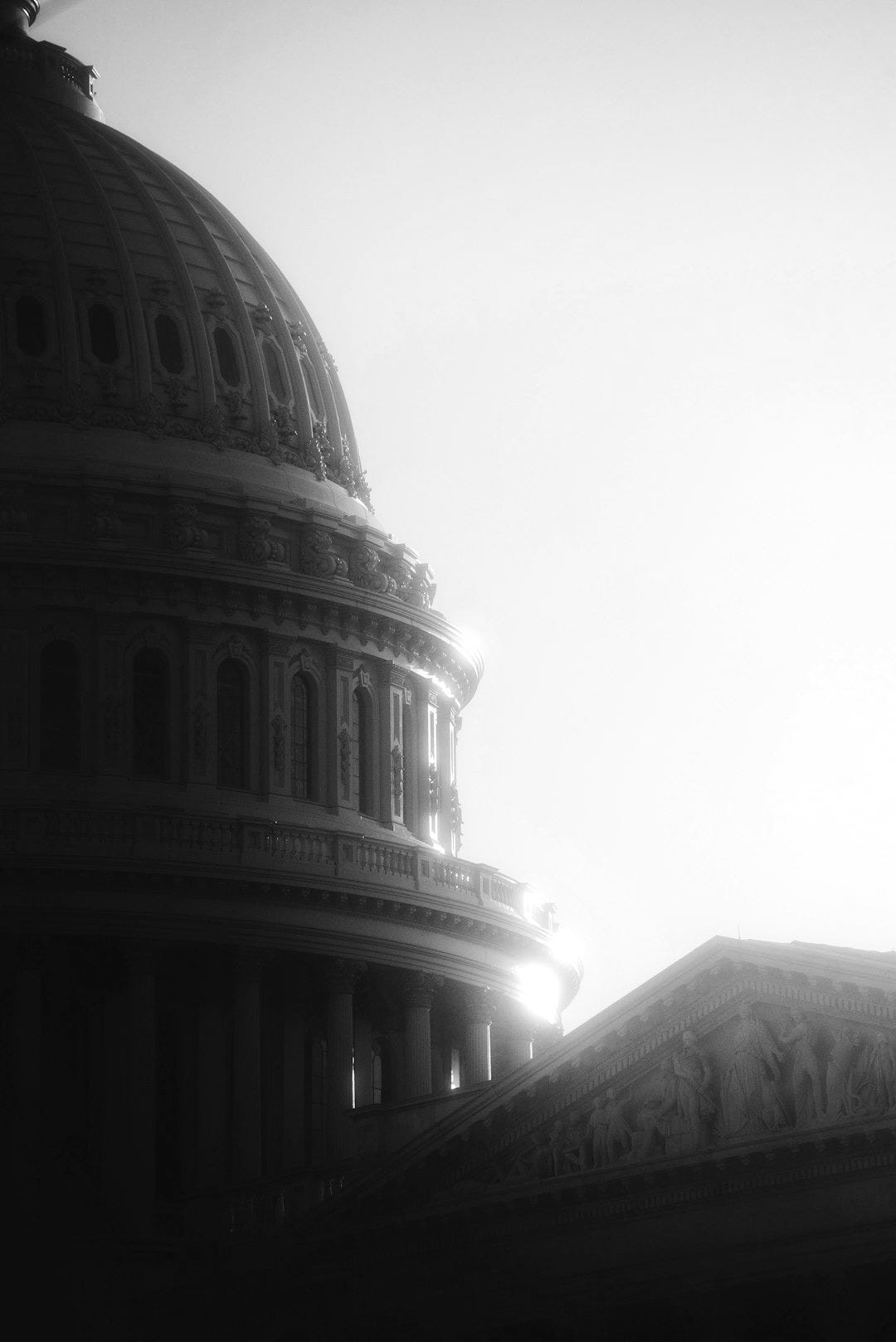 the dome of a building with a clock on it