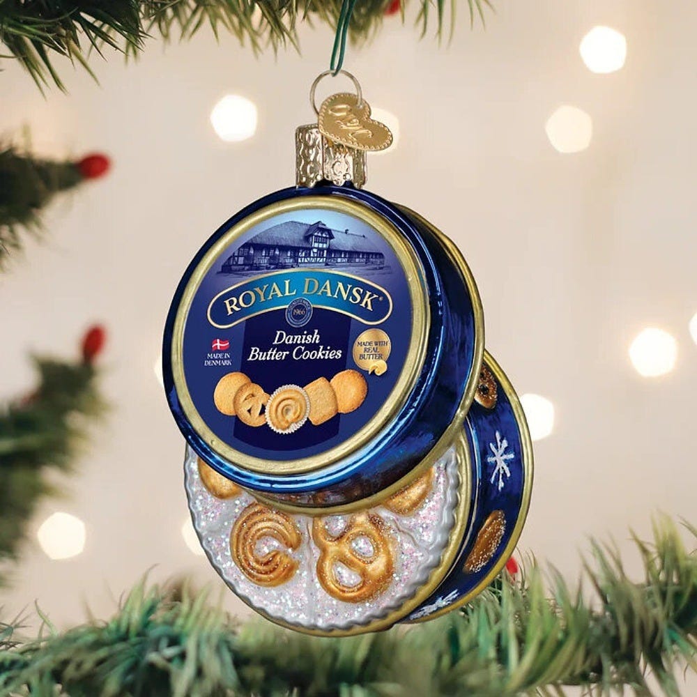 The Royal Dansk cookie tin ornament on a Christmas tree. Image: Old World Christmas The Royal Dansk cookie tin ornament on a Christmas tree. Image: Old World Christmas