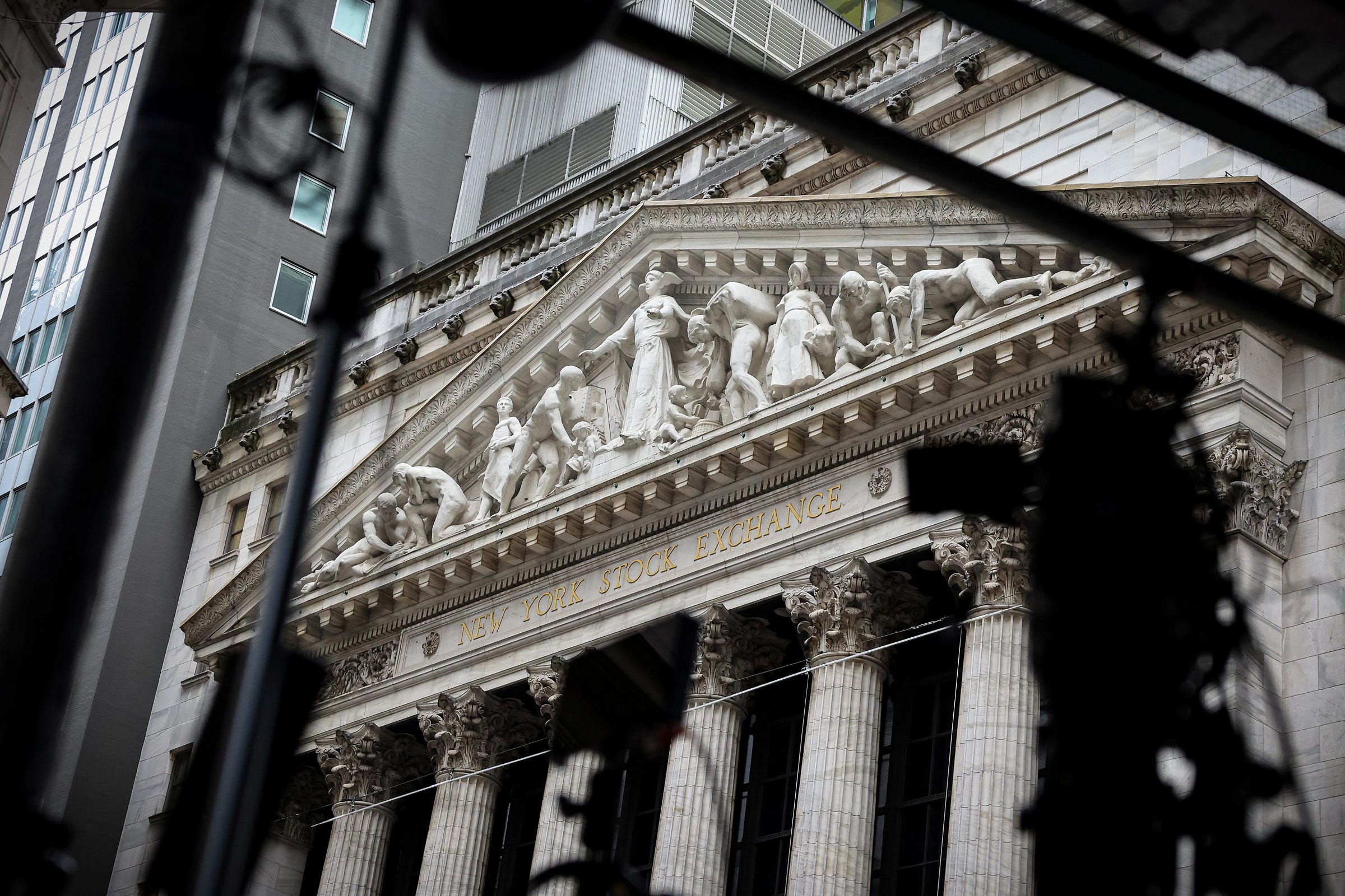 A camera points at the front of the NYSE in New York