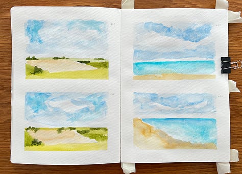 Watercolour landscapes in a sketchbook