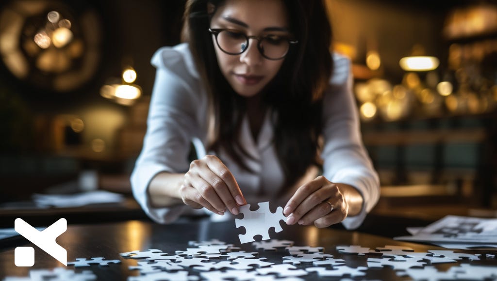 woman-executive-with-puzzle-pieces-the-executive-designer-blog