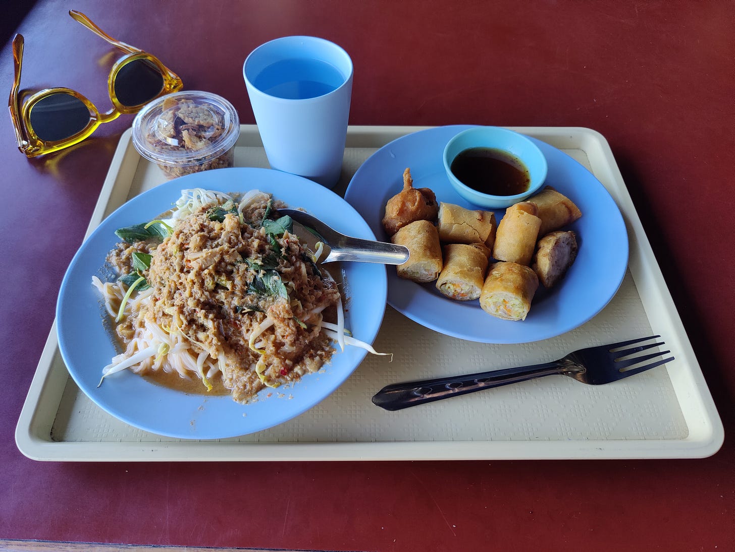 full plates of thai food