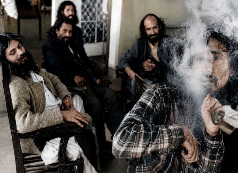 Members of the Zion Coptic sect unwinding at their Star Island compound. Thomas Reilly, aka Brother Louv, is seated on the right. Courtesy of the Miami Herald, photograph Michael Steinbacher.