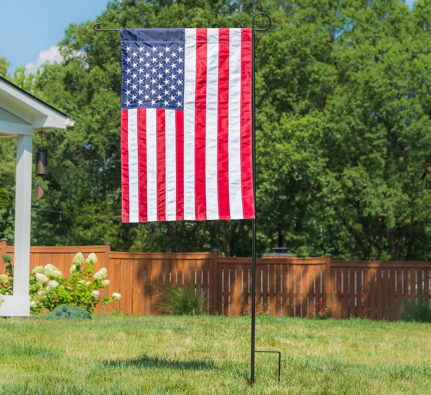 U.S. flag on garden stand (union left, away from vertical)