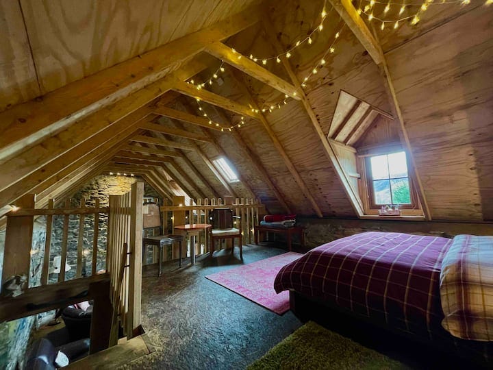 Bedroom in the eves. Fairy lights a plenty. 