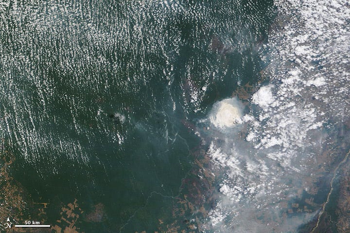 Satellite image of cloud and smoke interactions in the Brazilian Amazon. Satellite image of cloud and smoke interactions in the Brazilian Amazon.