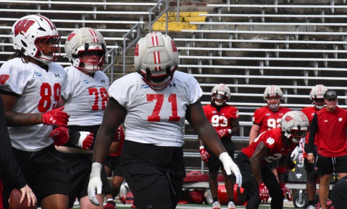 Wisconsin Badgers offensive lineman PJ Wilkins on the field during a fall camp practice. Wisconsin Badgers offensive lineman PJ Wilkins on the field during a fall camp practice.