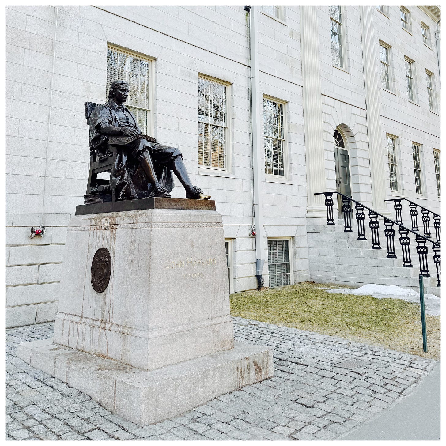 Photo of John Harvard statue in Harvard Yard