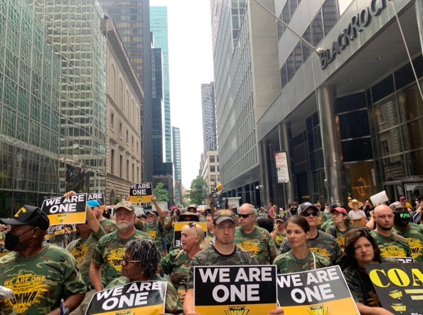 Photo of a crowd of striking UMWA miners and supporters protesting in front of BlackRock