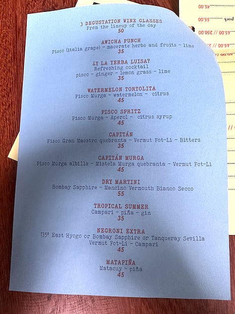The pages of Awicha's menu including appetizers, duck dishes, mains, and an extensive beverage menu.