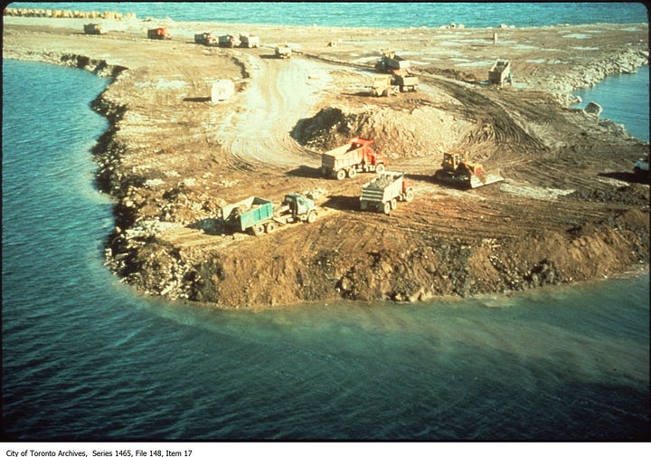 Dump trucks build the Leslie Street Spit and ring-billed gulls congregate on the finished landfill.
