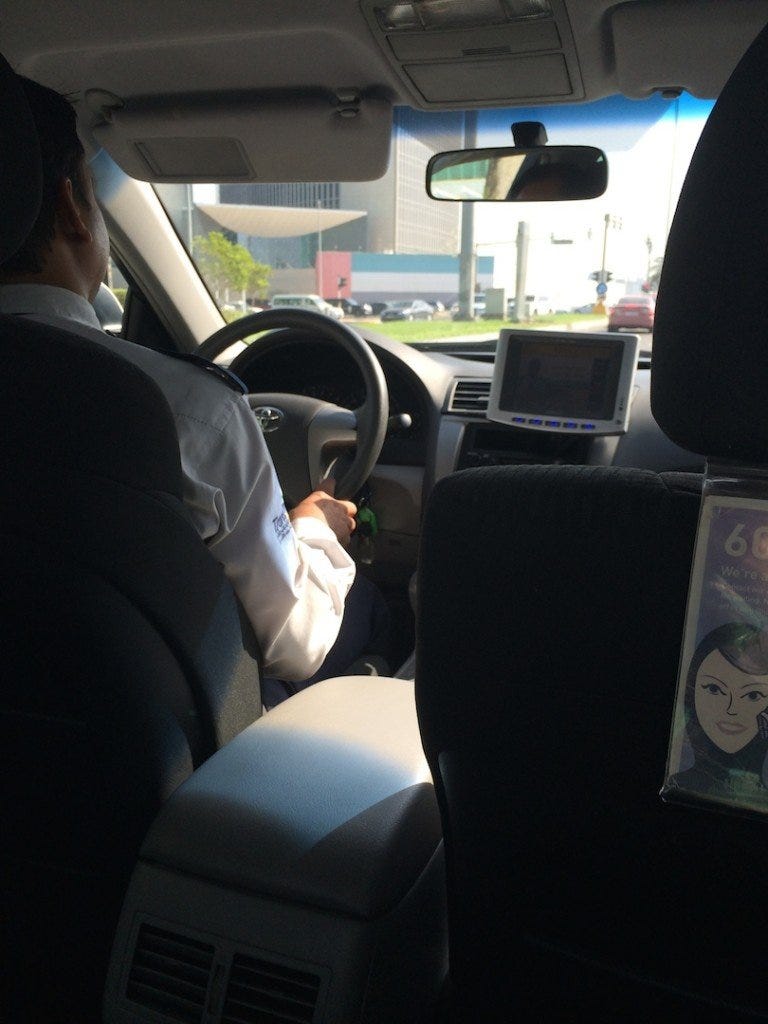 On the way to work in a taxi On the way to work in a taxi