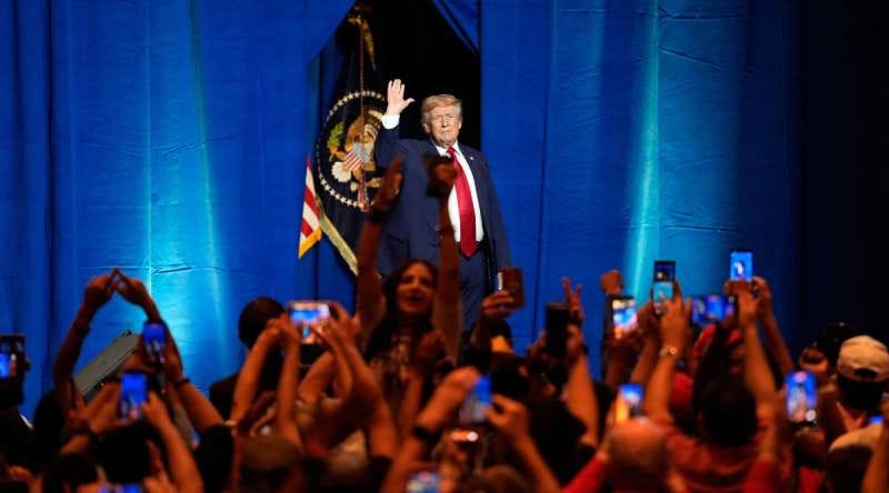 President Donald Trump waves to a rally of people in Las Vegas. President Donald Trump waves to a rally of people in Las Vegas.