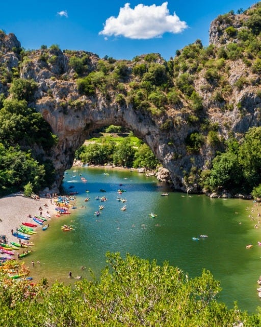 May be an image of lake and Stari Most